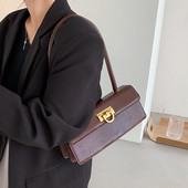 Új modell női bőrtáska fém rögzítéssel és bőr fogantyúval