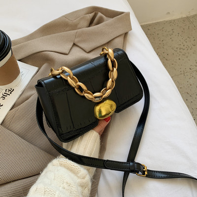 Öko bőrből készült női táska, rövid fém fogantyúval