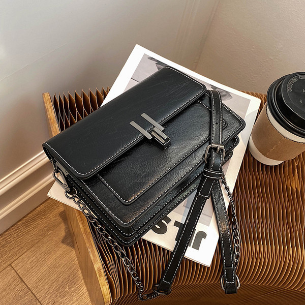 Naiste igapäevane neljas värvitoonis pika sangaga nahast kott