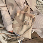 Uue mudeliga naistekott, nahast sangadega ja metallist pandlaga kotitüüp