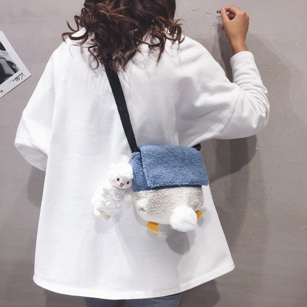 Väike mitmes värvitoonis suleline õlakott