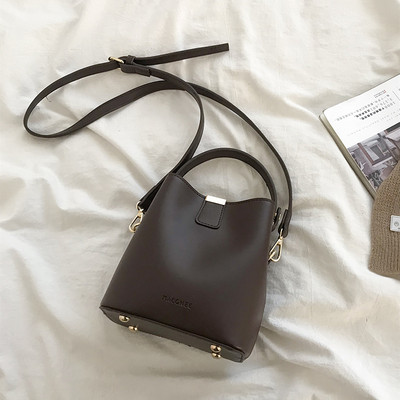 Μικρή ρετρό οικολογική δερμάτινη τσάντα με δύο λαβές