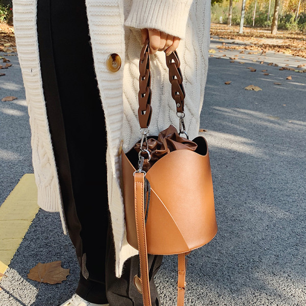 Moderna ženska kožna torba sa dvije ručke i vezicom