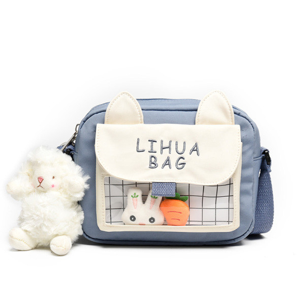 Moderna ženska torba sa džepom i privjeskom