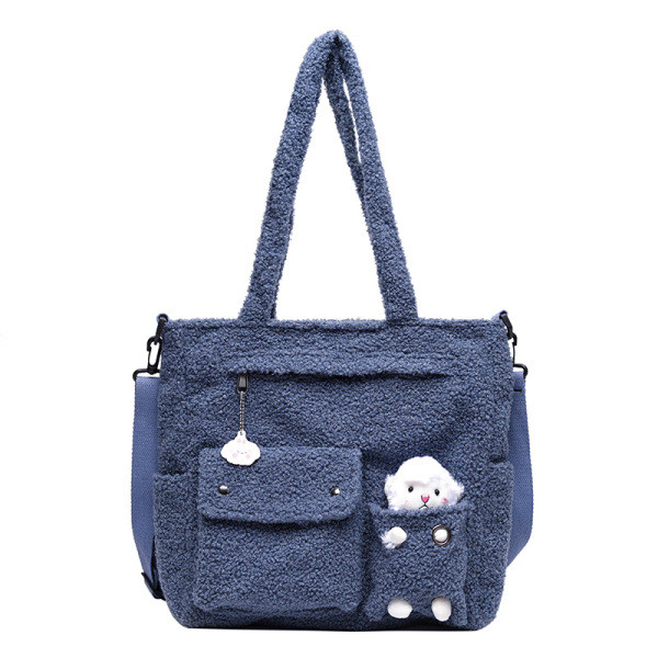 Modern női pehelytáska elülső zsebbel és 3D elemmel