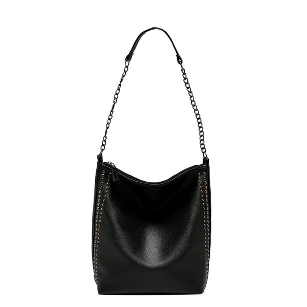 Casual ženska torba od eko kože sa metalnim cekerima