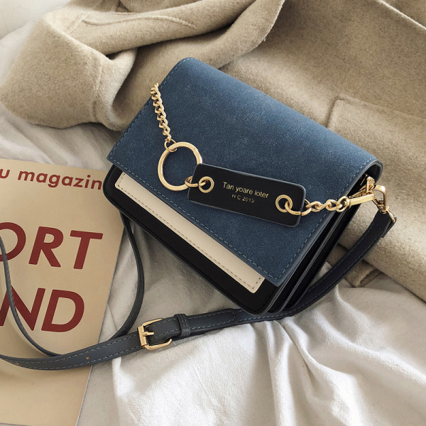 Modern női táska öko velúrból, fém elemmel