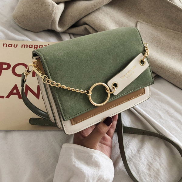 Modern női táska öko velúrból, fém elemmel