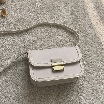 Έκο δερμάτινη και οικολογική τσάντα σουέτ με μεταλλικό κούμπωμα