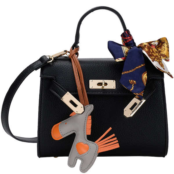 Ripatsiga nahast käekott