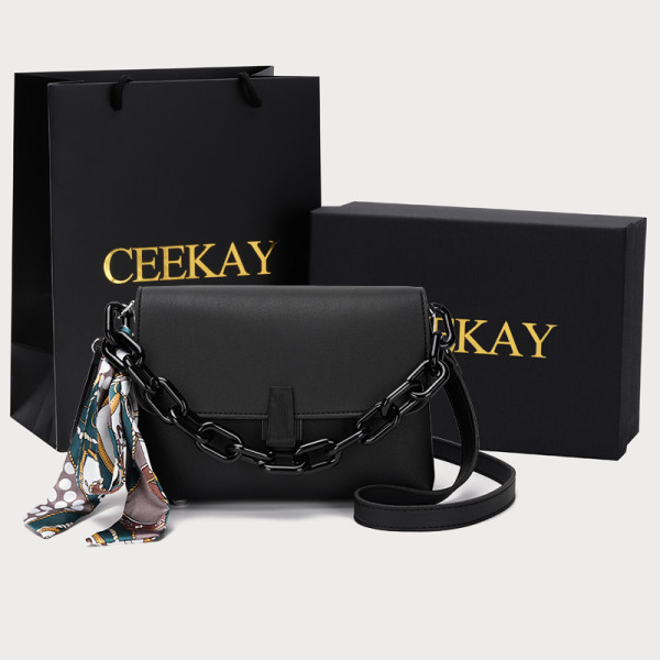 Ženska kožna torba s trakom u boji bijele, plave i crne boje