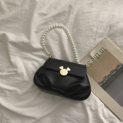 Retro stílusú táska gyöngyökkel