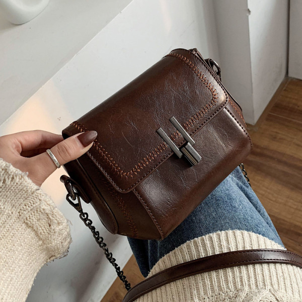 Kaasaegne naiste kunstnahk pika käepidemega