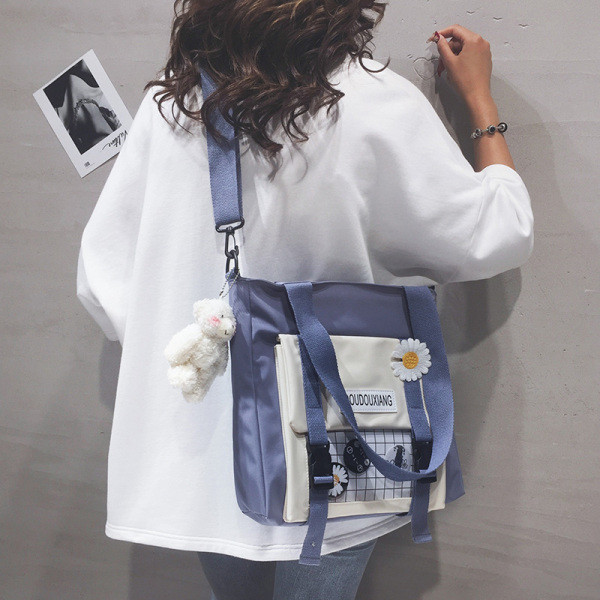 Igapäevane naiste kott tekstiilist taskuga