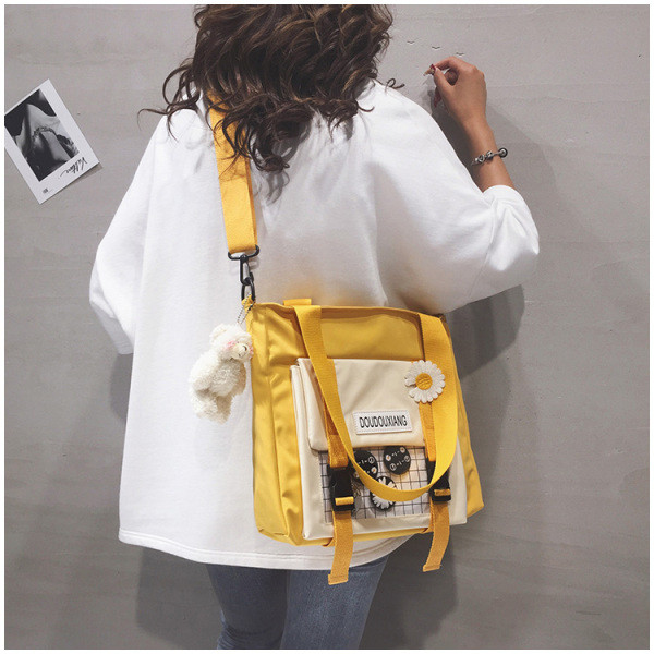 Igapäevane naiste kott tekstiilist taskuga