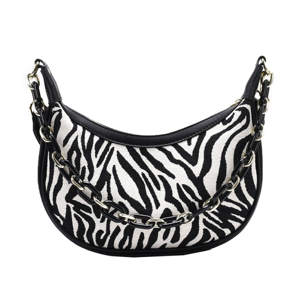 Sebratrüki ja kahe sangaga naistekott