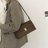 Väike ristkülikukujuline ühe sangaga ökonahast kott