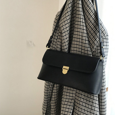 Väike ristkülikukujuline ühe sangaga ökonahast kott