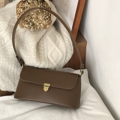 Väike ristkülikukujuline ühe sangaga ökonahast kott