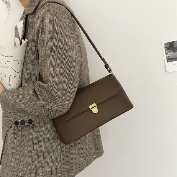 Väike ristkülikukujuline ühe sangaga ökonahast kott