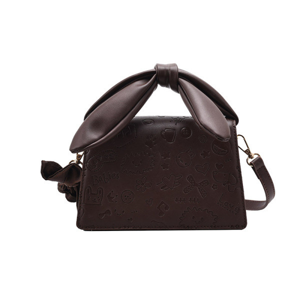 Elegantna torbica s vrpcom i dugom ručkom