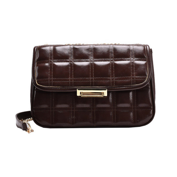 Naiste väike metallist kinnitusega kunstnahast kott