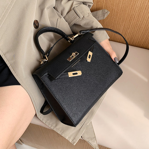 Elegantna ženska kožna torba s dvije ručke