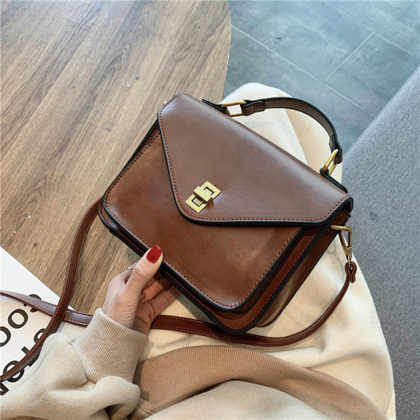 Naiste nahast kott pikkade ja lühikeste sangadega