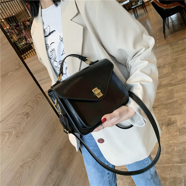 Naiste nahast kott pikkade ja lühikeste sangadega