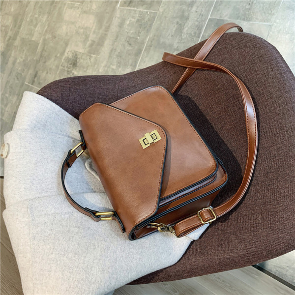 Naiste nahast kott pikkade ja lühikeste sangadega