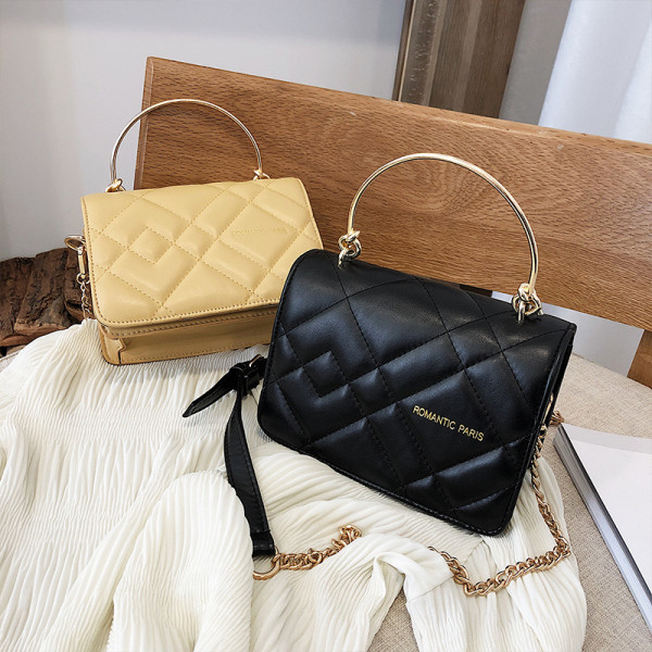 Moderna ženska kožna torba sa dvije metalne ručke