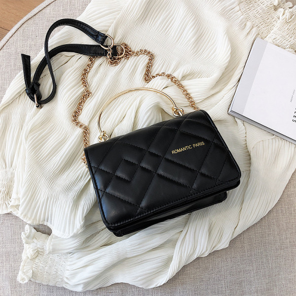 Moderna ženska kožna torba sa dvije metalne ručke