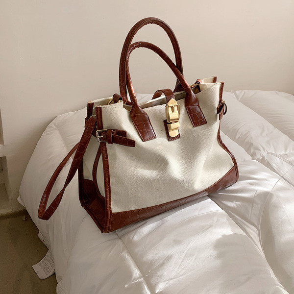 Retro stiilis lühikeste ja pikkade sangadega naistekott