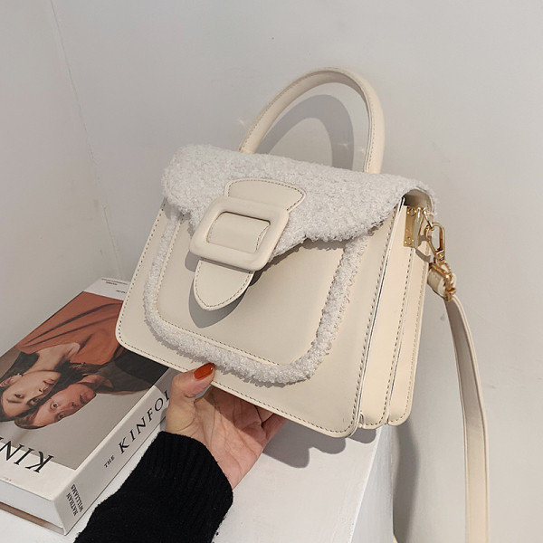 Modern női táska két füllel és toll