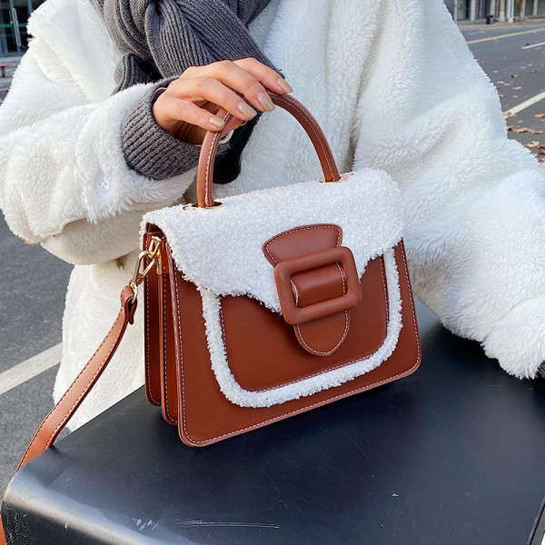 Modern női táska két füllel és toll