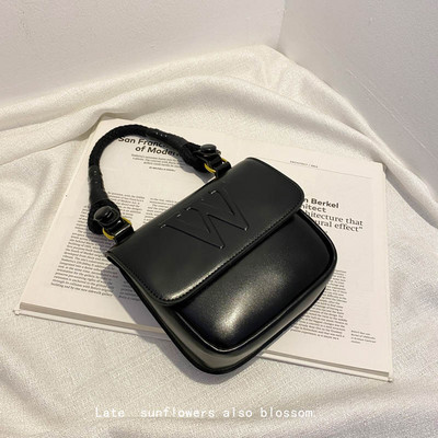 Kahes värvitoonis neetidega naistekott tavaline mudel