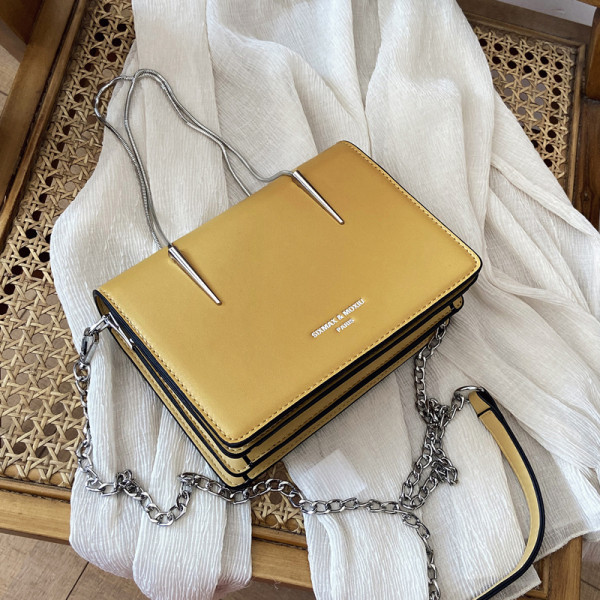 Κομψή γυναικεία έκο δερμάτινη τσάντα με δύο μεταλλικές λαβές