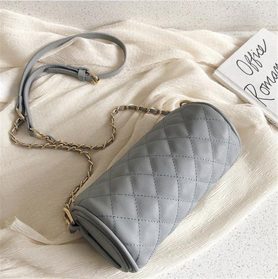 Női táska eko bőrből készült sima modell, fém fogantyúval