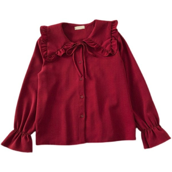 Korszerű női ing kerek nyakkivágással és gombokkal