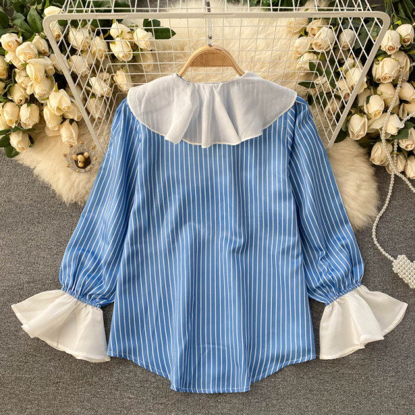 Ženska košulja s ovalnim izrezom i tilom