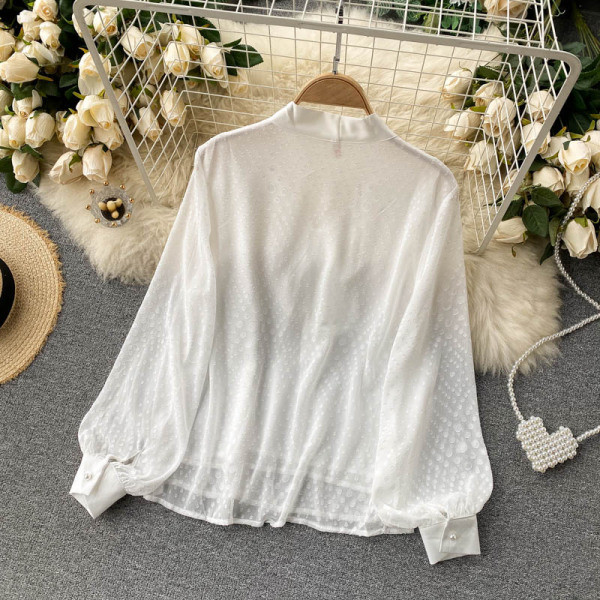 Modern női ing fehér színben, szalaggal