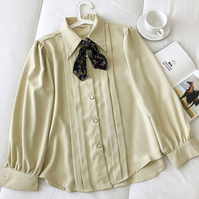 Moderna ženska jednobojna košulja na gumbe