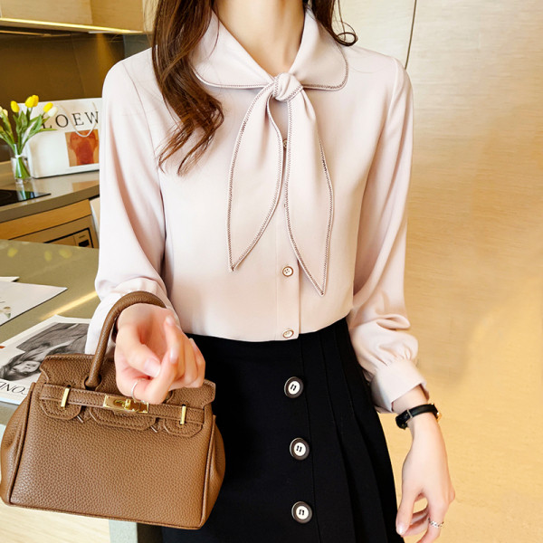 Beeži ja pikkade varrukatega naiste särk paela ja nööpidega