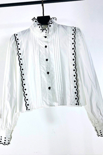 Moderna ženska košulja s polo kragnom i vezom