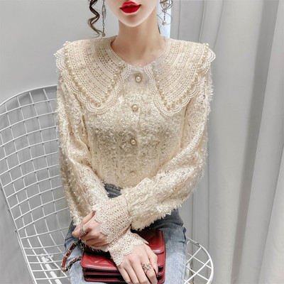 Naiste vabaaja särk nööpide ja tikanditega