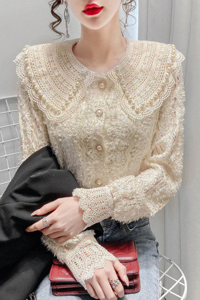 Naiste vabaaja särk nööpide ja tikanditega