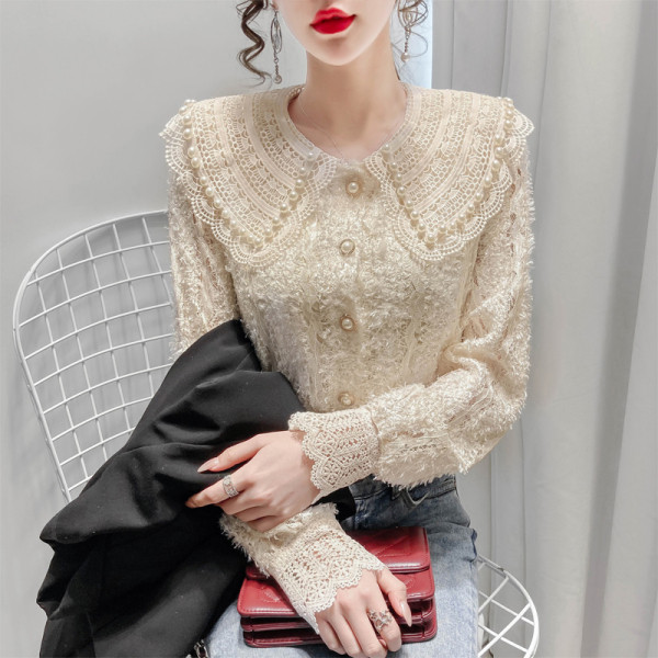 Naiste vabaaja särk nööpide ja tikanditega