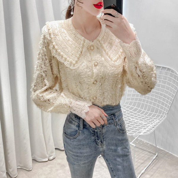 Naiste vabaaja särk nööpide ja tikanditega