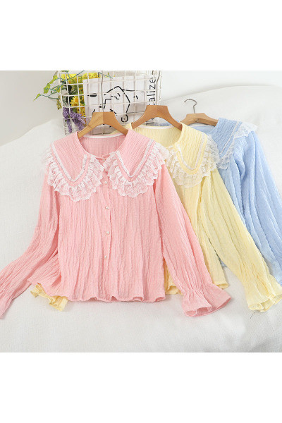 Pitsilise ja pikkade varrukatega naiste särk