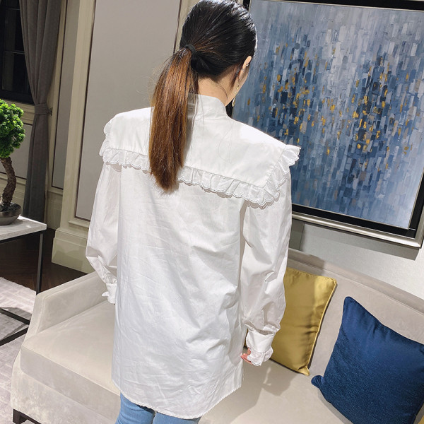 Modern női ing kerek nyakkivágással és fürtökkel